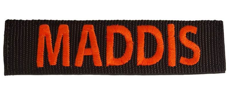 black patch with orange thread