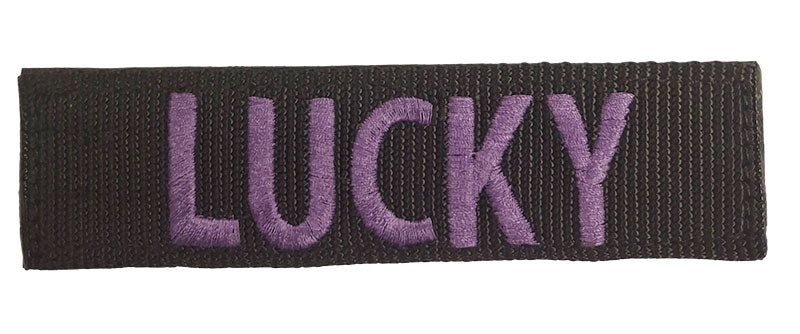 black patch with purple thread
